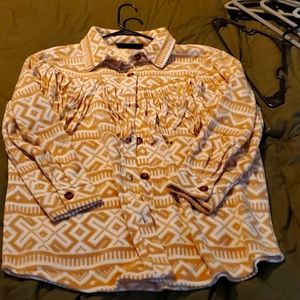 Western jacket with tassel detail.